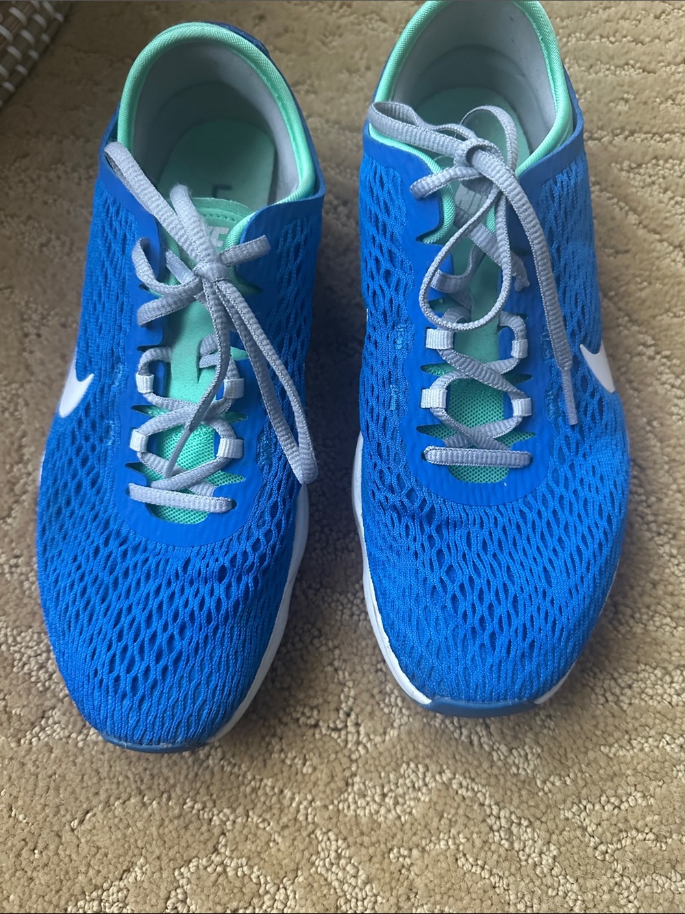 Nike Women’s Blue Mesh Running Shoes with Mint Accents
